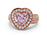 Rose gold Fancy Pink Heart Cut Halo Diamond Engagement Ring with Pave Split Shank and Four-Prong Setting