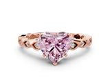Rose gold Fancy Pink Heart Cut Solitaire Diamond Ring with Infinity Twist Band and Four-Prong Setting