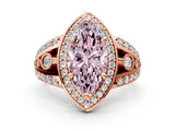 Rose gold Fancy Pink Marquise Cut Diamond Halo Ring with Split Shank and Bezel Accents and Four-Prong Setting