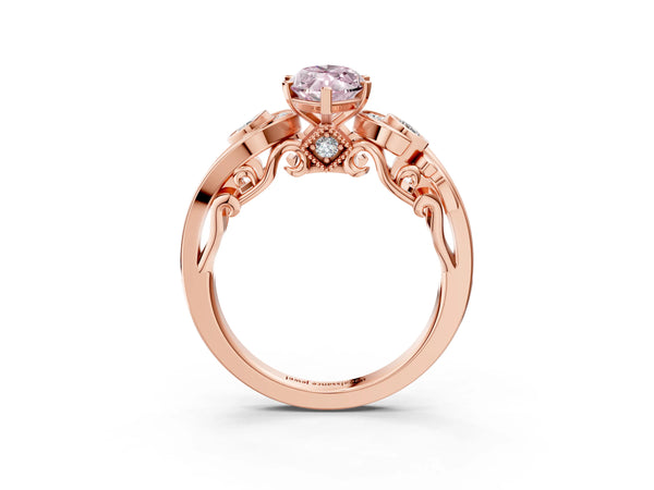 Rose gold Fancy Pink Marquise Cut Diamond Solitaire Ring with Milgrain Pavé Band and Four-Prong Setting