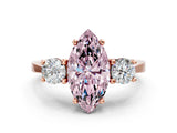 Rose gold Fancy Pink Marquise Cut Diamond Three-Stone Engagement Ring with Prong Setting and Pavé Band