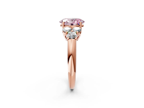 Rose gold Fancy Pink Oval  Cut Diamond Cluster Ring with Round Accent Stones and Prong Setting on a Classic Band