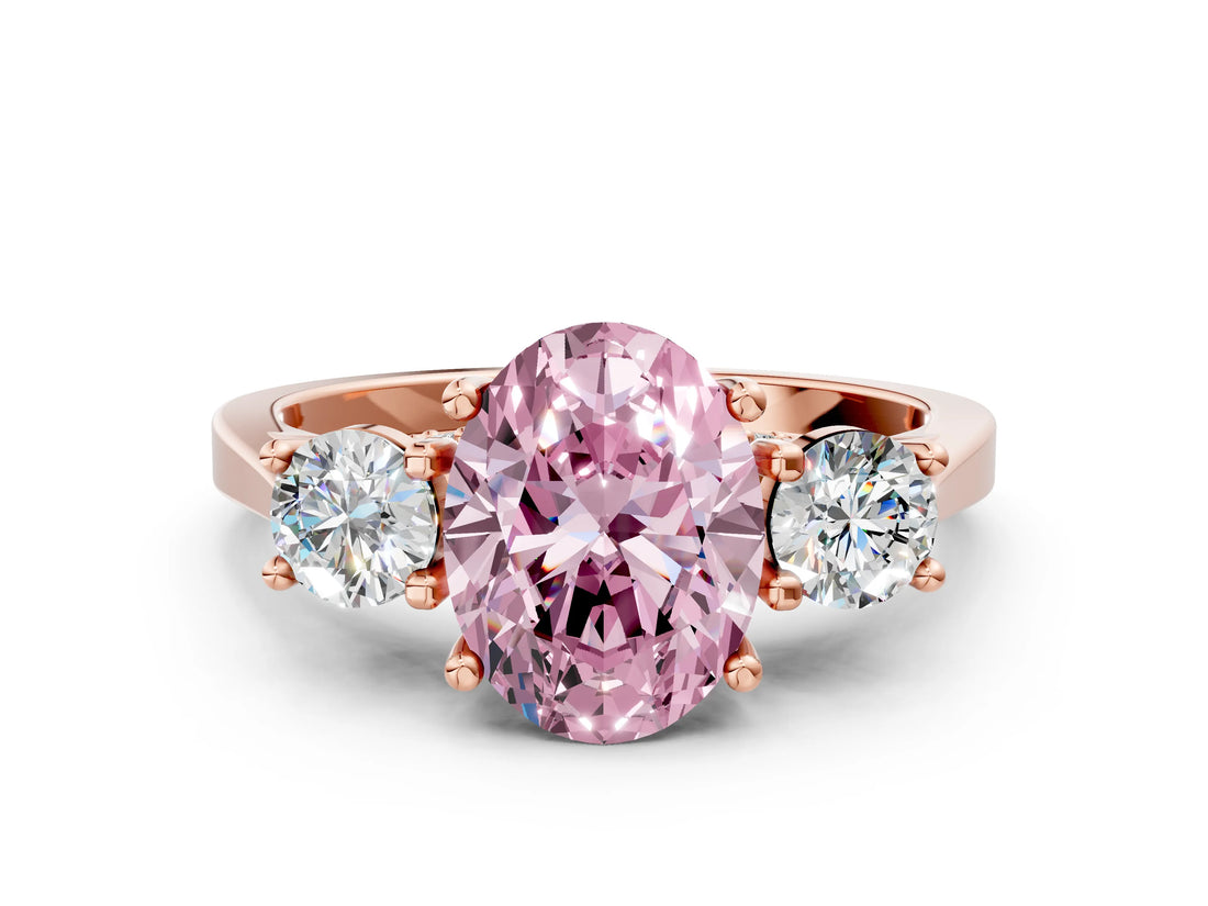 Rose gold Fancy Pink Oval Cut Diamond Three-Stone Engagement Ring with Prong Setting and Pavé Band