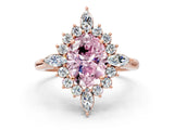 Rose gold Fancy Pink Oval Cut Halo Diamond Cluster Ring with Marquise and Round Stones on a White Gold Band with Prong Setting
