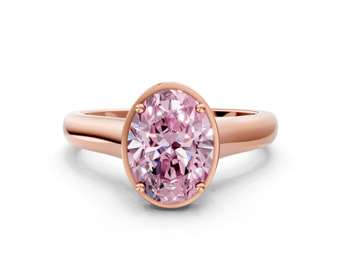 Rose gold Fancy Pink Oval Cut Solitaire Diamond Engagement Ring with Four-Prong Setting and Tapered Band