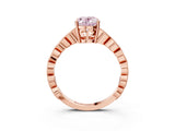 Rose gold Fancy Pink Oval Cut Solitaire Diamond Ring with Infinity Twist Band and Four-Prong Setting_3