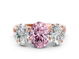Rose gold Fancy Pink Oval Cut Three-Stone Diamond Ring with Prong Setting on a Classic Band_12