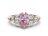 Rose gold Fancy Pink Pear  Cut Diamond Cluster Ring with Round Accent Stones and Prong Setting on a Classic Band_51