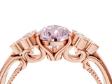 Rose gold Fancy Pink Pear  Cut Diamond Engagement Ring with Bezel Set Round Side Stones and Prong Setting_55