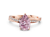 Rose gold Fancy Pink Pear Cut Diamond Engagement Ring with Side Stone Accents and Four-Prong Setting_60