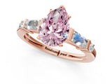 Rose gold Fancy Pink Pear  Cut Diamond Ring with Baguette Side Stones, Channel Set Band, and Four-Prong Setting_25