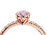 Rose gold Fancy Pink Pear Cut Diamond Solitaire Pavé Engagement Ring with Round Band and Prong Setting_65