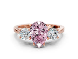 Rose gold Fancy Pink Pear Cut Diamond Three-Stone Engagement Ring with Prong Setting and Pavé Band
