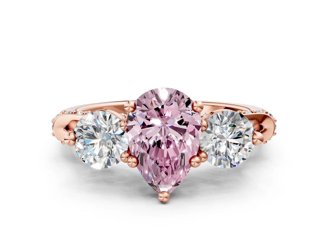 Rose gold Fancy Pink Pear Cut Diamond Three-Stone Ring with Prong Setting and Pavé Band