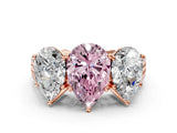 Rose gold Fancy Pink Pear Cut Diamond Three-Stone Ring with Prong Setting and Textured Band