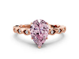 Rose gold Fancy Pink Pear Cut Solitaire Diamond Ring with Infinity Twist Band and Four-Prong Setting