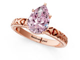 Rose gold Fancy Pink Pear  Solitaire Diamond Engagement Ring with XO Engraved Band and Four-Prong Setting 1