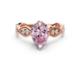 Rose gold Fancy Pink Pear  Solitaire Twist Band with Leaf Prong Setting