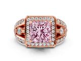 Rose gold Fancy Pink Princess Cut Diamond Halo Ring with Split Shank and Bezel Accents and Four-Prong Setting