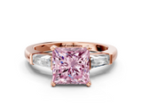 Rose gold Fancy Pink Princess  Solitaire with Tapered Baguette Side Stones on a Classic Band with Four-Prong Setting