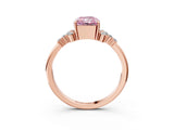 Rose gold Fancy Pink Radiant Cut Diamond Ring with Side Stones and Four-Prong Setting_98