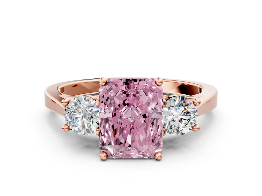 Rose gold Fancy Pink Radiant Cut Diamond Three-Stone Engagement Ring with Prong Setting and Pavé Band