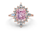 Rose gold Fancy Pink Radiant Cut Halo Diamond Cluster Ring with Marquise and Round Stones on a White Gold Band with Prong Setting