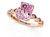 Rose gold Fancy Pink Radiant Cut Solitaire Diamond Ring with Infinity Twist Band and Four-Prong Setting_1