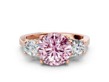 Rose gold Fancy Pink Round Cut Diamond Three-Stone Engagement Ring with Prong Setting and Pavé Band