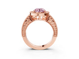 Rose gold Fancy Pink Round  Cut Halo Diamond Ring with Pavé Band and Four-Prong Setting_32