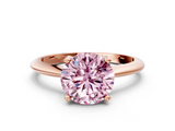 Rose gold Fancy Pink Round  Cut Solitaire Ring with Four-Prong Setting on a Classic Band