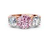 Rose gold Fancy Pink Round Cut Three-Stone Diamond Ring with Prong Setting on a Classic Band_12