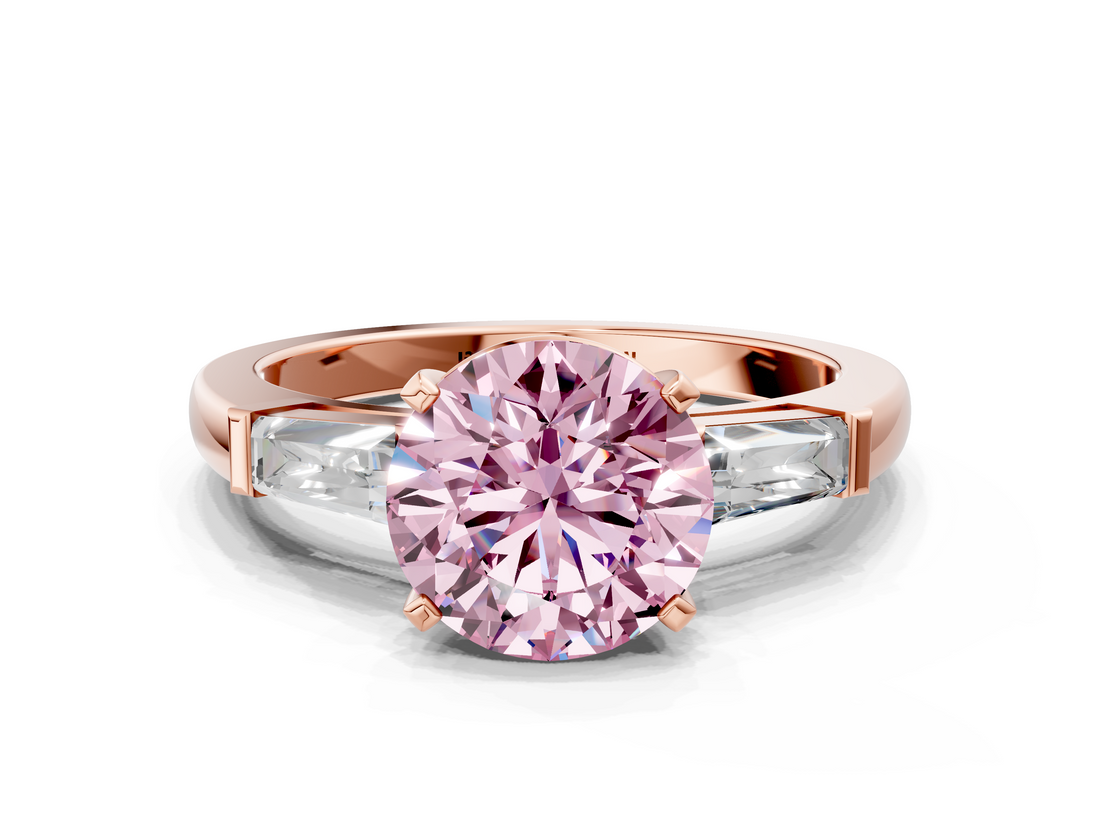 Rose gold Fancy Pink Round  Solitaire with Tapered Baguette Side Stones on a Classic Band with Four-Prong Setting