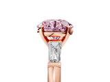 Rose gold Fancy Pink Round  Solitaire with Tapered Baguette Side Stones on a Classic Band with Four-Prong Setting_5