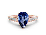 Rose gold Fancy White Pear Cut Blue Sapphire Solitaire Ring with Cathedral Setting and Pavé Band