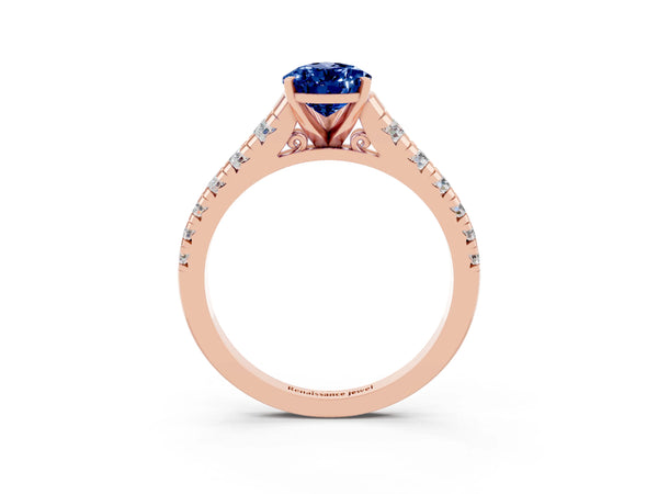 Rose gold Pear Cut Blue Sapphire Cathedral Solitaire Ring with Round  Pavé Band