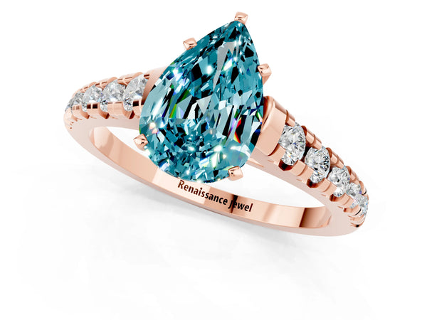 Rose gold Pear Cut Blue Topaz Cathedral Solitaire Ring with Round  Pavé Band