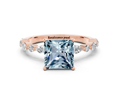 Rose gold Fancy White Princess Cut Aquamarine Solitaire with Side Stones on a Pavé Band and Four-Prong Setting