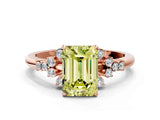 Rose gold Fancy Yellow Emerald Cut Diamond Ring with Side Stones and Four-Prong Setting_112