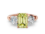 Rose gold Fancy Yellow Emerald Cut Diamond Three-Stone Ring with Prong Setting and Pavé Band