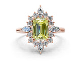 Rose gold Fancy Yellow Emerald Cut Halo Diamond Cluster Ring with Marquise and Round Stones on a White Gold Band with Prong Setting