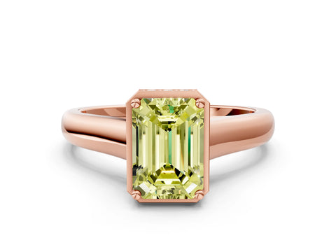 Rose gold Fancy Yellow Emerald Cut Solitaire Diamond Engagement Ring with Four-Prong Setting and Tapered Band