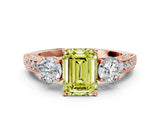 Rose gold Fancy Yellow Emerald Cut Three-Stone Diamond Ring with Pavé Band and Four-Prong Setting