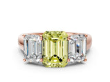 Rose gold Fancy Yellow Emerald Cut Three-Stone Diamond Ring with Prong Setting on a Classic Band_12