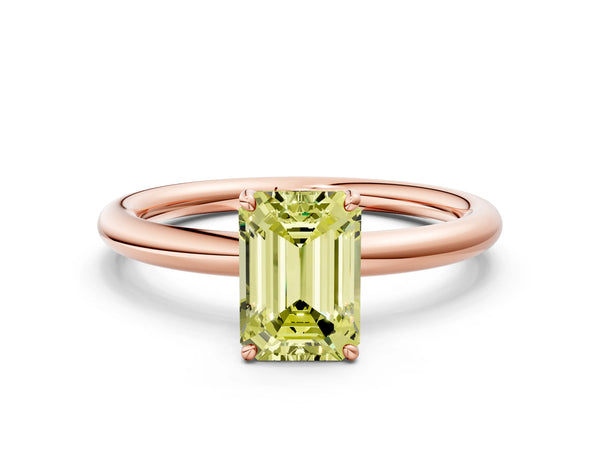 Rose gold Fancy Yellow Emerald  Solitaire Diamond Ring with Four-Prong Setting on a Plain Band