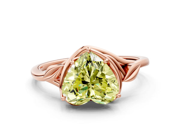 Rose gold Fancy Yellow Heart Cut Diamond Solitaire Ring with Twist Band and Four-Prong Setting