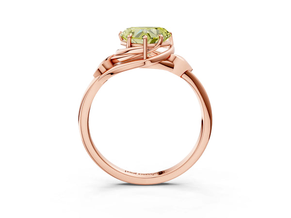 Rose gold Fancy Yellow Heart Cut Diamond Solitaire Ring with Twist Band and Four-Prong Setting