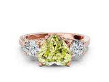 Rose gold Fancy Yellow Heart Cut Diamond Three-Stone Engagement Ring with Prong Setting and Pavé Band
