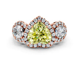Rose gold Fancy Yellow Heart Cut Diamond Three-Stone Halo Ring with Prong Setting and Pavé Accents