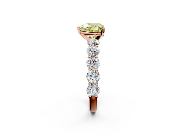 Rose gold Fancy Yellow Heart Cut Diamond Prong Setting with Side Stones on a Pave Band